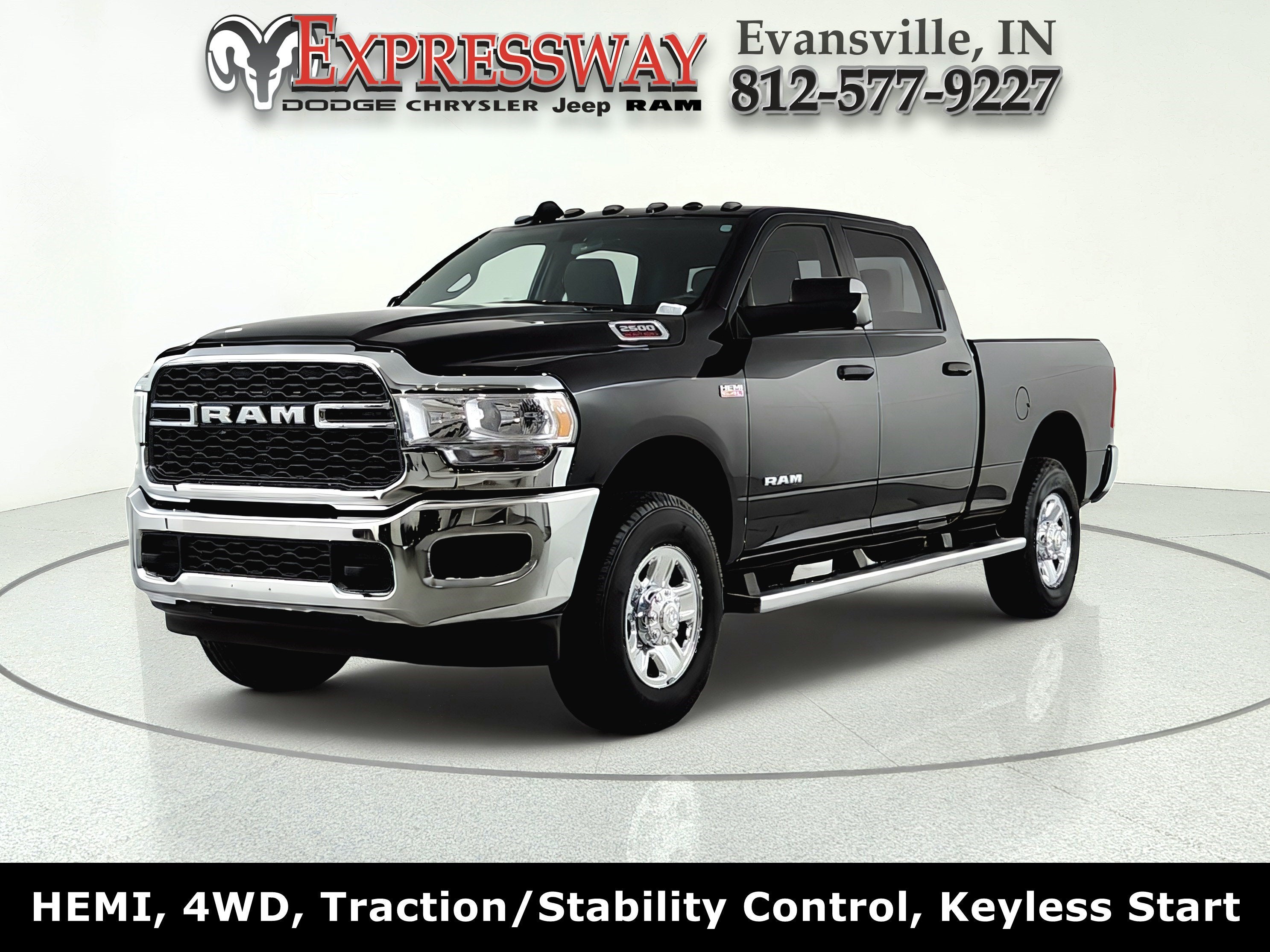 2021 RAM 2500 Tradesman in Diamond Black Crystal Pearlcoat — front three-quarter view